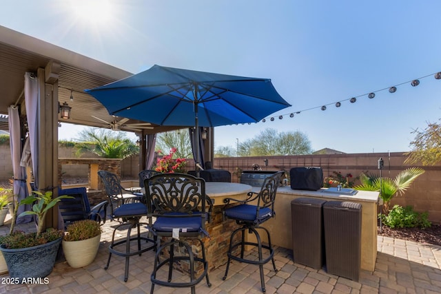 view of patio featuring a bar