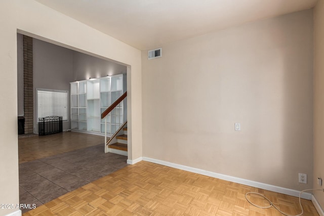 966 E Driftwood Dr, Tempe, AZ 85283 - unfurnished room featuring baseboards and stairway