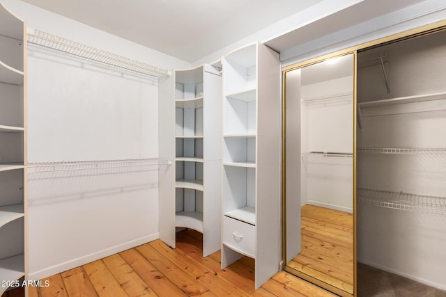 966 E Driftwood Dr, Tempe, AZ 85283 - spacious closet with hardwood / wood-style flooring