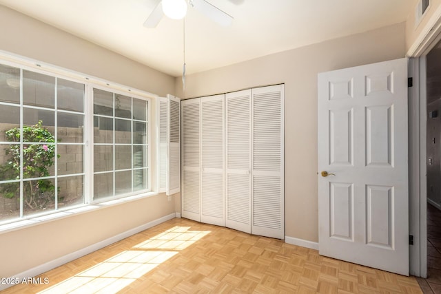 966 E Driftwood Dr, Tempe, AZ 85283 - unfurnished bedroom with baseboards, a closet, and a ceiling fan