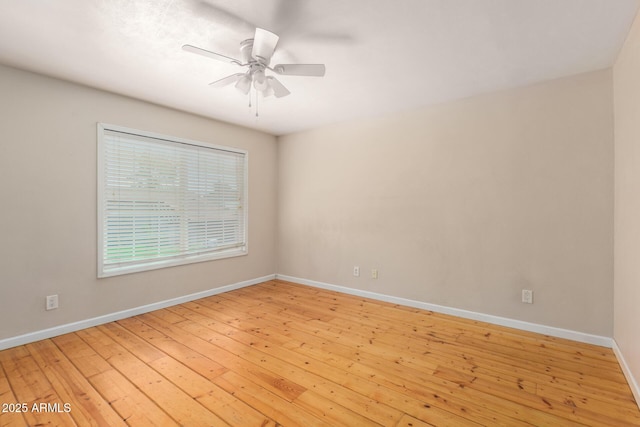 966 E Driftwood Dr, Tempe, AZ 85283 - unfurnished room with ceiling fan, baseboards, and light wood finished floors