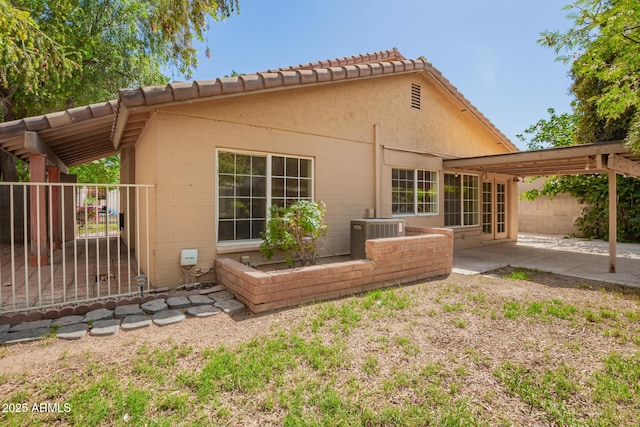 966 E Driftwood Dr, Tempe, AZ 85283 - rear view of house featuring central AC and a patio