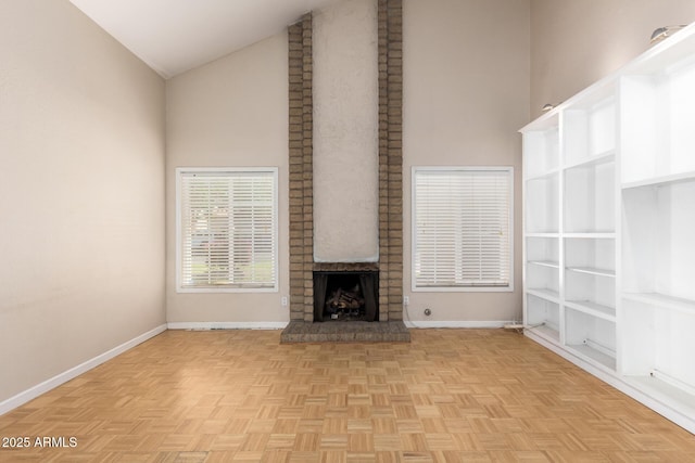 966 E Driftwood Dr, Tempe, AZ 85283 - unfurnished living room with high vaulted ceiling, baseboards, and a brick fireplace