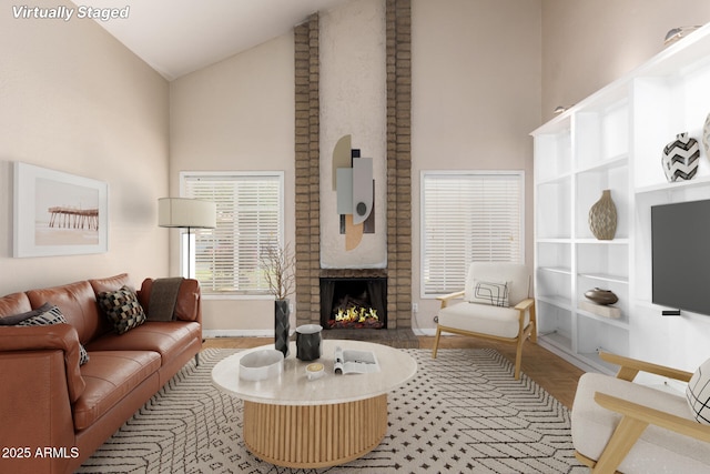 966 E Driftwood Dr, Tempe, AZ 85283 - living room featuring high vaulted ceiling, baseboards, and a fireplace