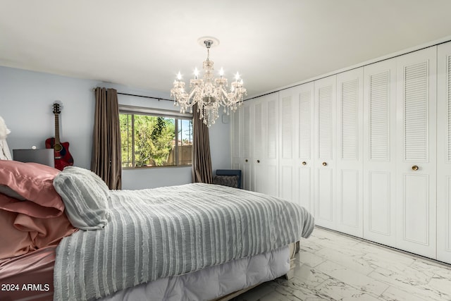 bedroom with a chandelier