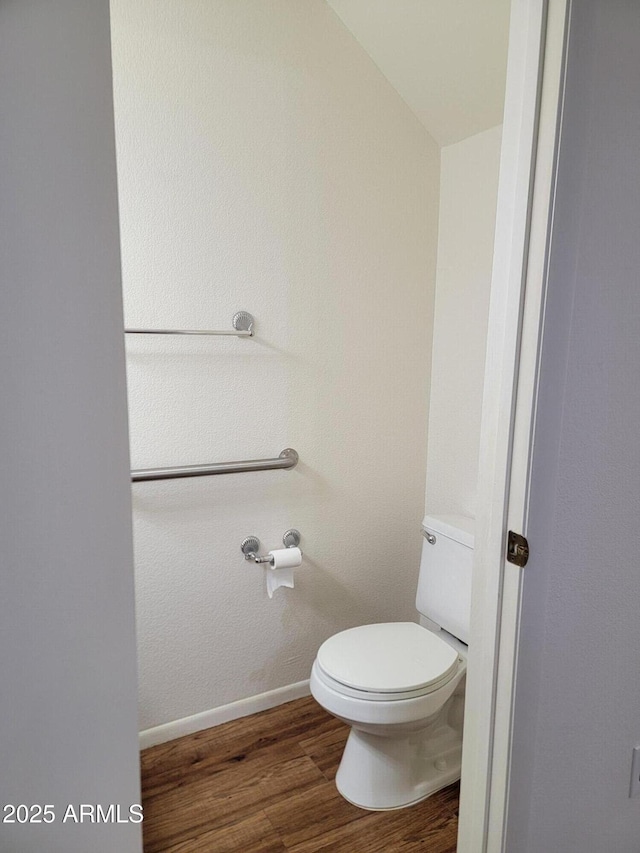 7801 N 44th Dr Unit 1036, Glendale, AZ 85301 - bathroom with wood finished floors and toilet