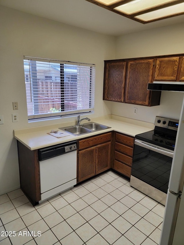 7801 N 44th Dr Unit 1036, Glendale, AZ 85301 - kitchen featuring white dishwasher, stainless steel electric range, light countertops, and range hood