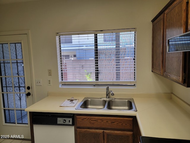 7801 N 44th Dr Unit 1036, Glendale, AZ 85301 - kitchen featuring dishwasher, healthy amount of natural light, and light countertops