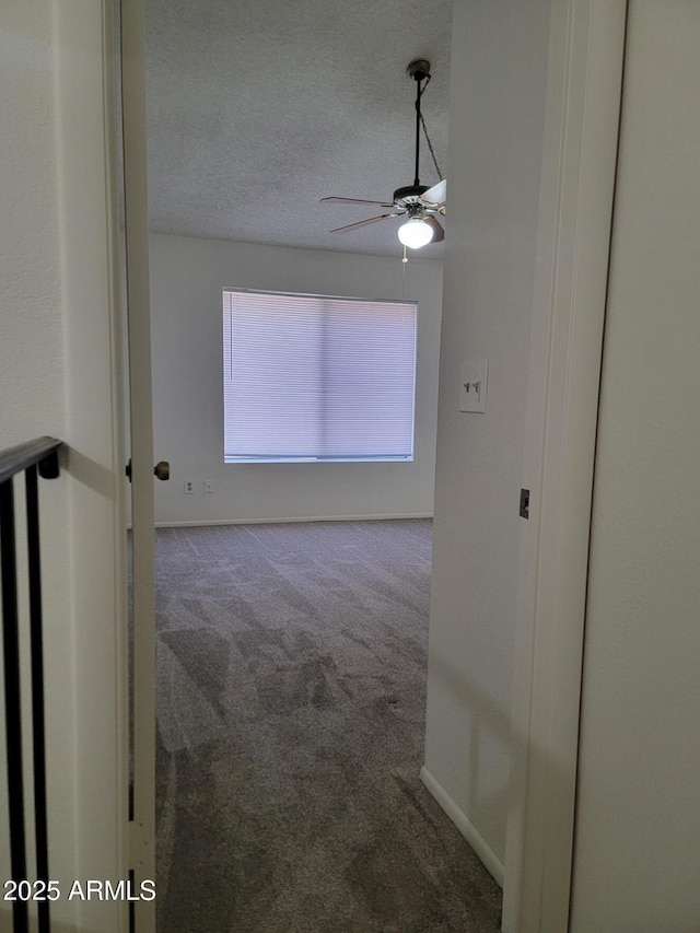 7801 N 44th Dr Unit 1036, Glendale, AZ 85301 - carpeted spare room with a ceiling fan and a textured ceiling