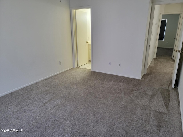 7801 N 44th Dr Unit 1036, Glendale, AZ 85301 - carpeted spare room featuring baseboards
