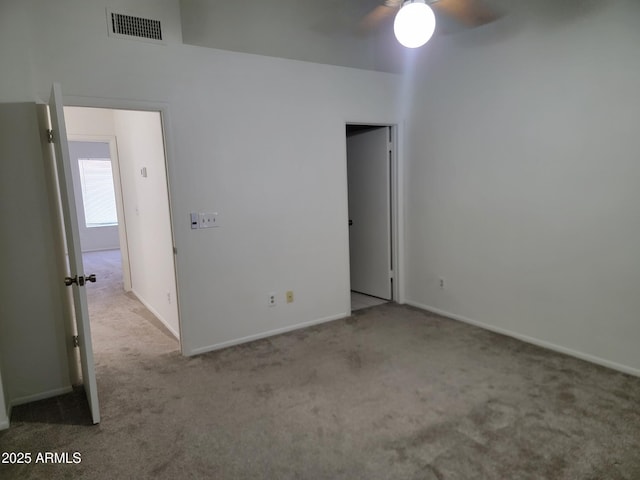7801 N 44th Dr Unit 1036, Glendale, AZ 85301 - unfurnished bedroom with carpet floors and a ceiling fan