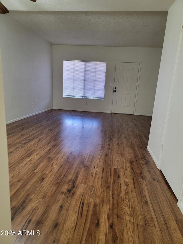 7801 N 44th Dr Unit 1036, Glendale, AZ 85301 - empty room featuring dark wood-type flooring and a ceiling fan