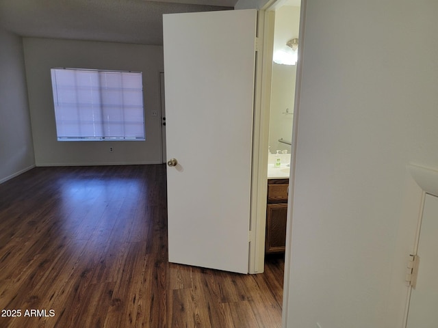 7801 N 44th Dr Unit 1036, Glendale, AZ 85301 - unfurnished room featuring dark wood-type flooring