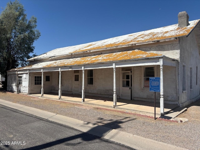 361 N Quartz St, Florence, AZ 85132 - rear view of property featuring a porch