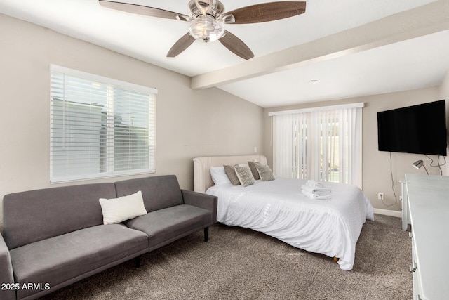 carpeted bedroom with ceiling fan, lofted ceiling with beams, multiple windows, and baseboards