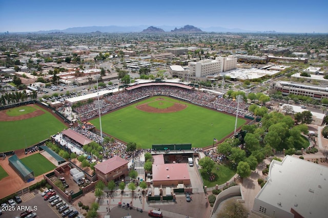 bird's eye view with a mountain view and a city view