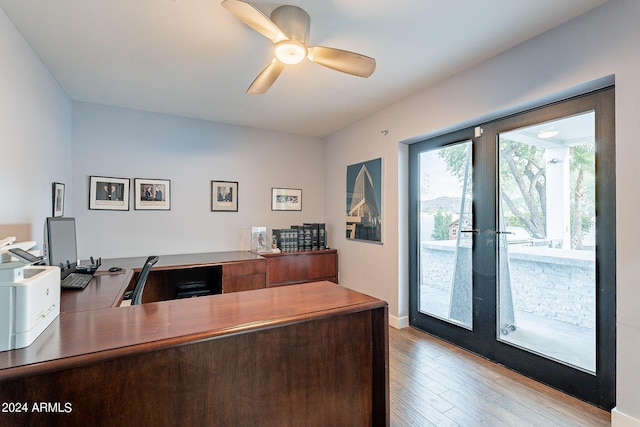 office area with ceiling fan, french doors, and light hardwood / wood-style flooring