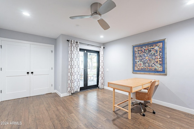 unfurnished office featuring ceiling fan, wood-type flooring, and french doors