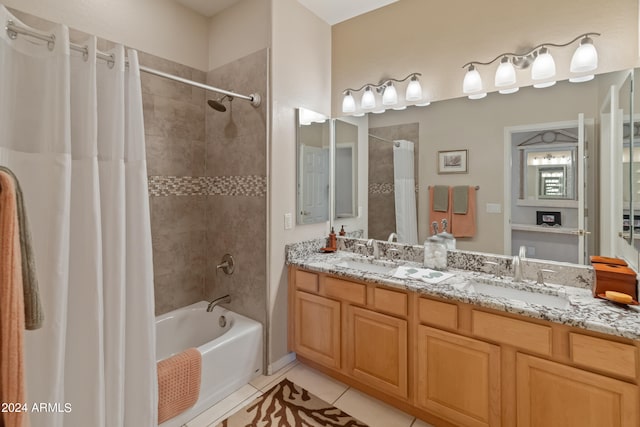 bathroom featuring vanity, shower / bath combination with curtain, and tile patterned floors