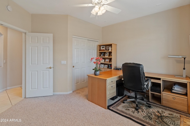 carpeted home office with ceiling fan