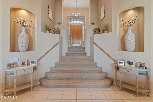 foyer with light tile patterned flooring