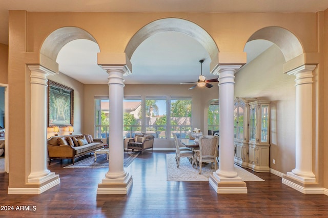 dining space with ceiling fan and dark wood-type flooring