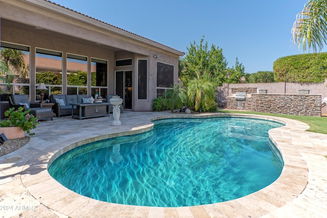 view of pool featuring a patio and an outdoor hangout area