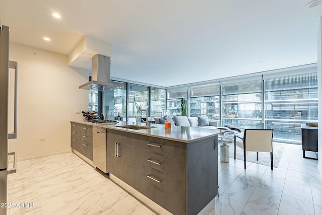 kitchen with modern cabinets, marble finish floor, a sink, appliances with stainless steel finishes, and island range hood