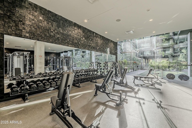 gym with floor to ceiling windows