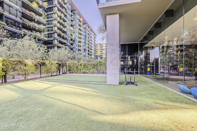 view of community featuring a lawn