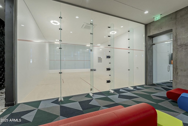 building lobby featuring visible vents