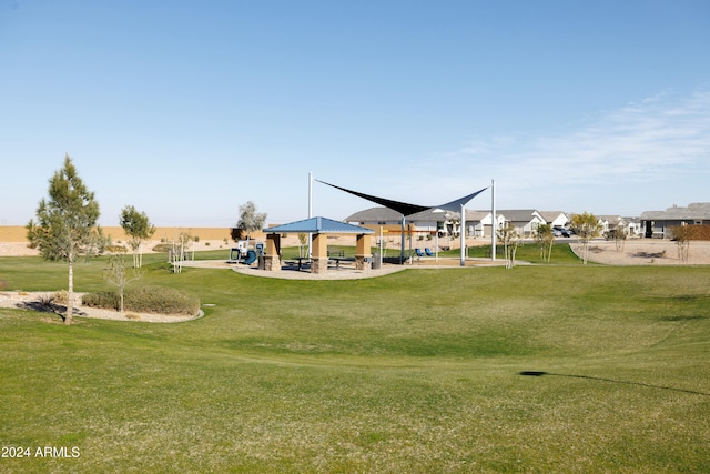 view of playground featuring a gazebo and a yard