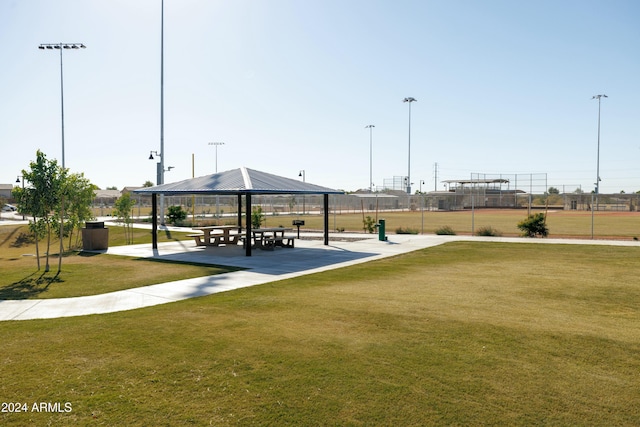 view of property's community featuring a gazebo and a lawn