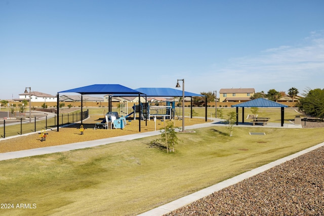 view of play area featuring a gazebo and a lawn