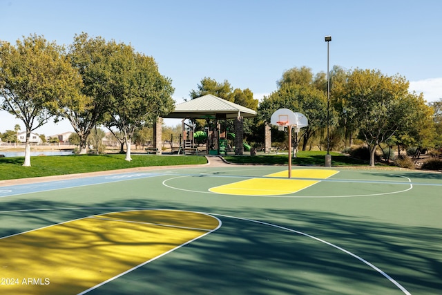 view of sport court with a gazebo and a lawn