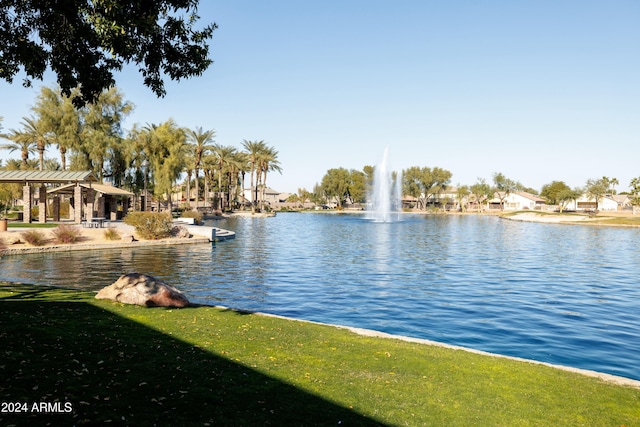 property view of water with a gazebo