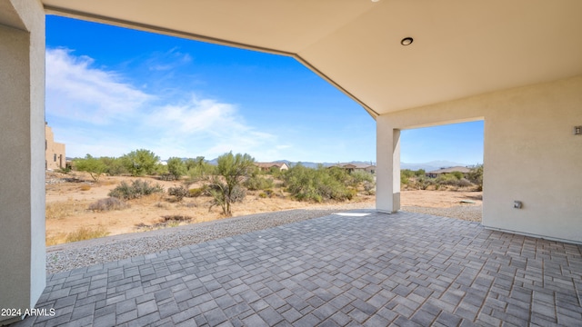 view of patio featuring a mountain view