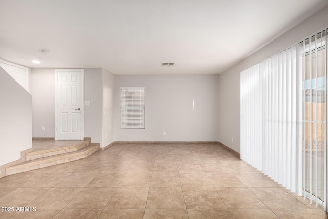 view of tiled spare room