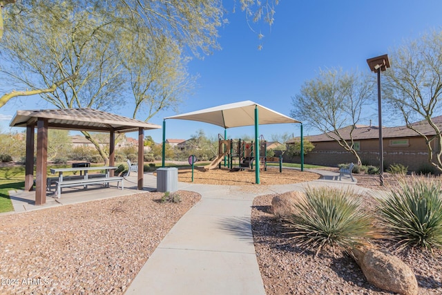 view of property's community with a playground