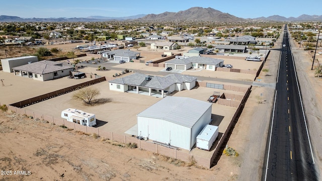 birds eye view of property with a residential view and a mountain view