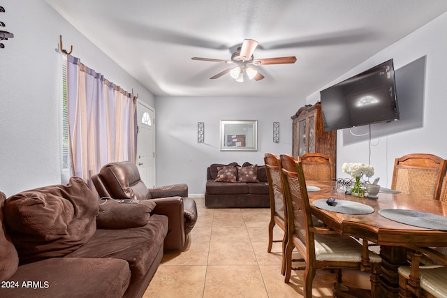 living room with ceiling fan and light tile floors