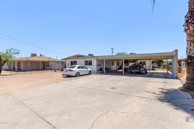 view of front of house featuring a carport