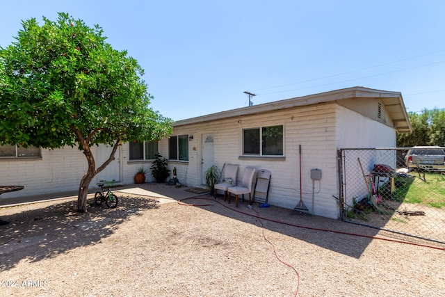 rear view of property with a patio