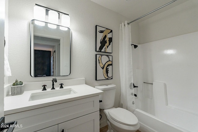 full bathroom featuring vanity, toilet, and shower / bathtub combination with curtain