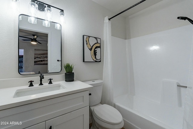 full bathroom featuring ceiling fan, shower / tub combo with curtain, vanity, and toilet