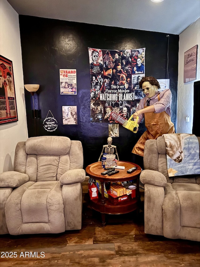 cinema room featuring hardwood / wood-style flooring