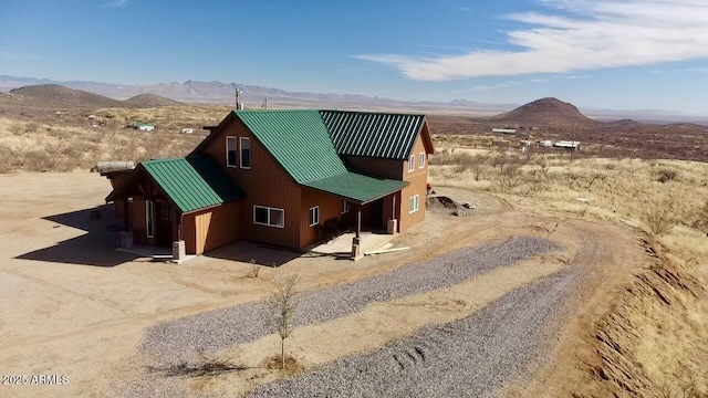 view of side of property featuring a mountain view