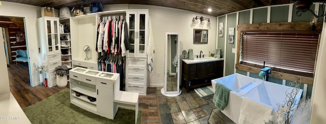 bathroom with vanity and wooden ceiling