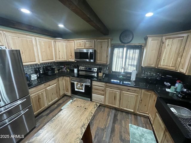 kitchen with appliances with stainless steel finishes, light brown cabinetry, tasteful backsplash, dark wood-type flooring, and beam ceiling