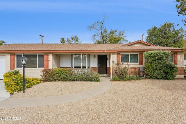 single story home with a garage